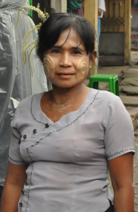 Burmese woman with traditional face makeup